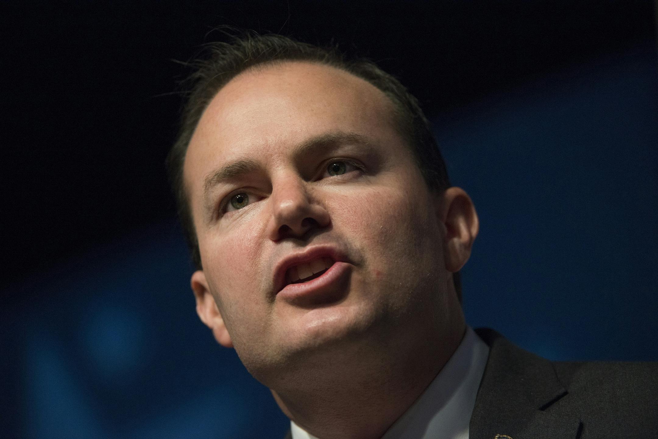 FILE - In this June 19, 2014 file photo, Sen. Mike Lee, R-Utah speaks in Washington. Conservative Republicans want to drag must-pass spending bills into their fight with President Barack Obama over his planned executive action on immigration, inviting comparisons to last yearís shutdown showdown over the health care law. In the Senate, Jeff Sessions of Alabama and Lee of are among those arguing to use an upcoming must-pass spending bill _ either in December or next year _ to try to block Ob