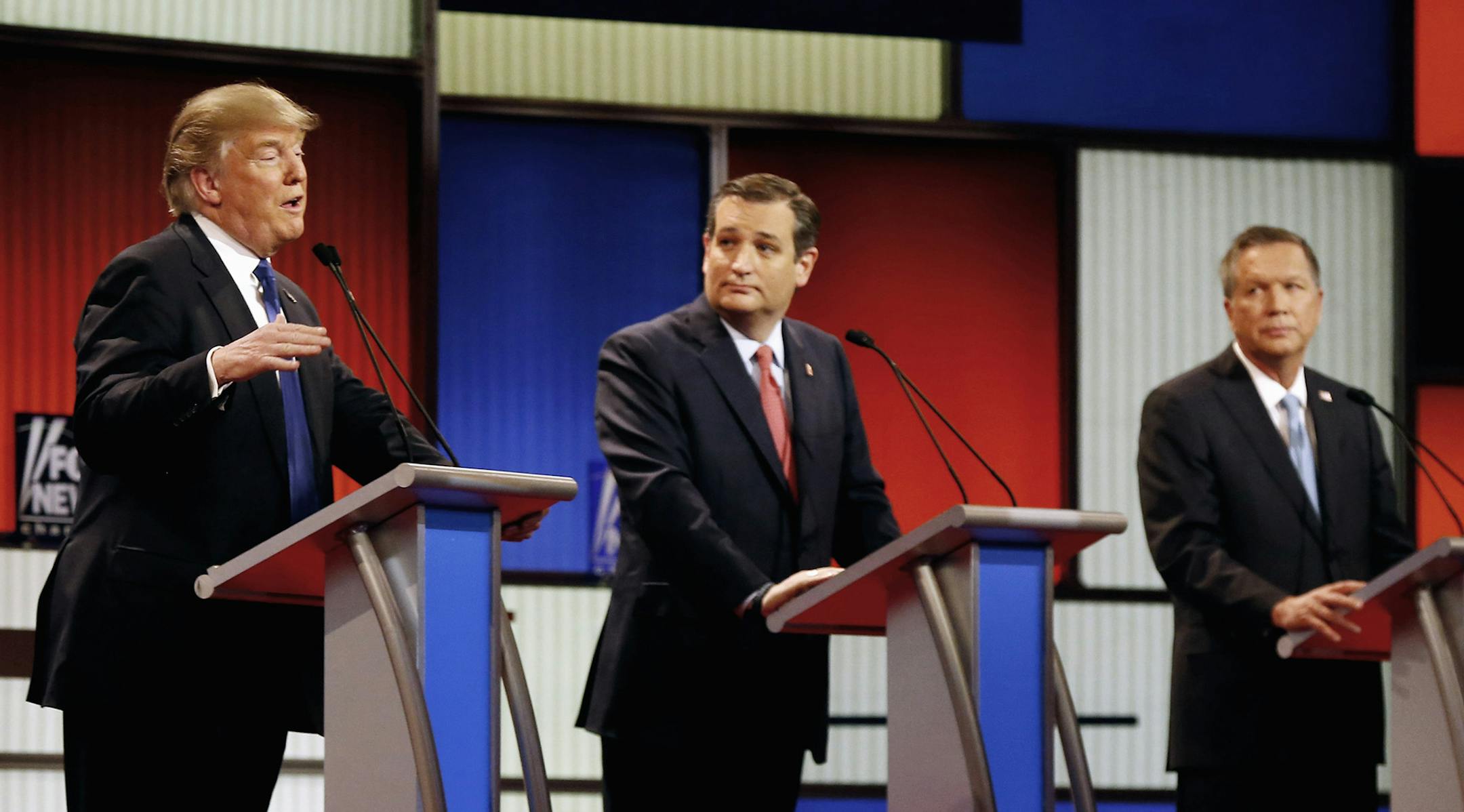 FILE- In this March 3, 2016 file photo, Republican presidential candidates, businessman Donald Trump, Sen. Ted Cruz, R-Texas, and Ohio Gov. John Kasich appear during a Republican presidential primary debate at the Fox Theatre in Detroit. Michigan Republicans meet Saturday, April 9, in Lansing for their annual convention with one of the main agenda items the choosing of delegates to the partyís presidential convention in July in Cleveland. (AP Photo/Paul Sancya) ORG XMIT: MIN2016041319195734