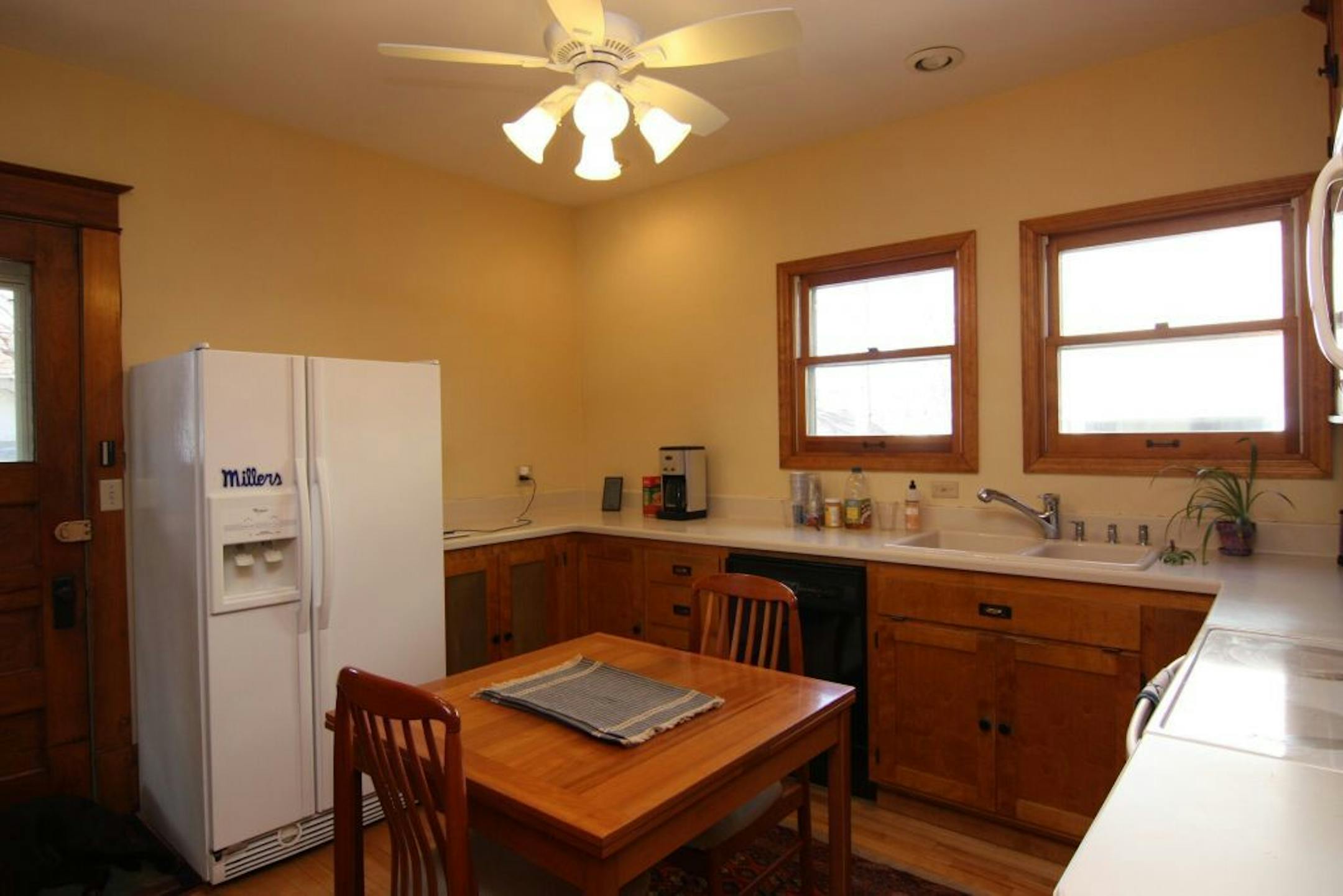 BEFORE: The kitchen was dark and separated from the rest of the house.