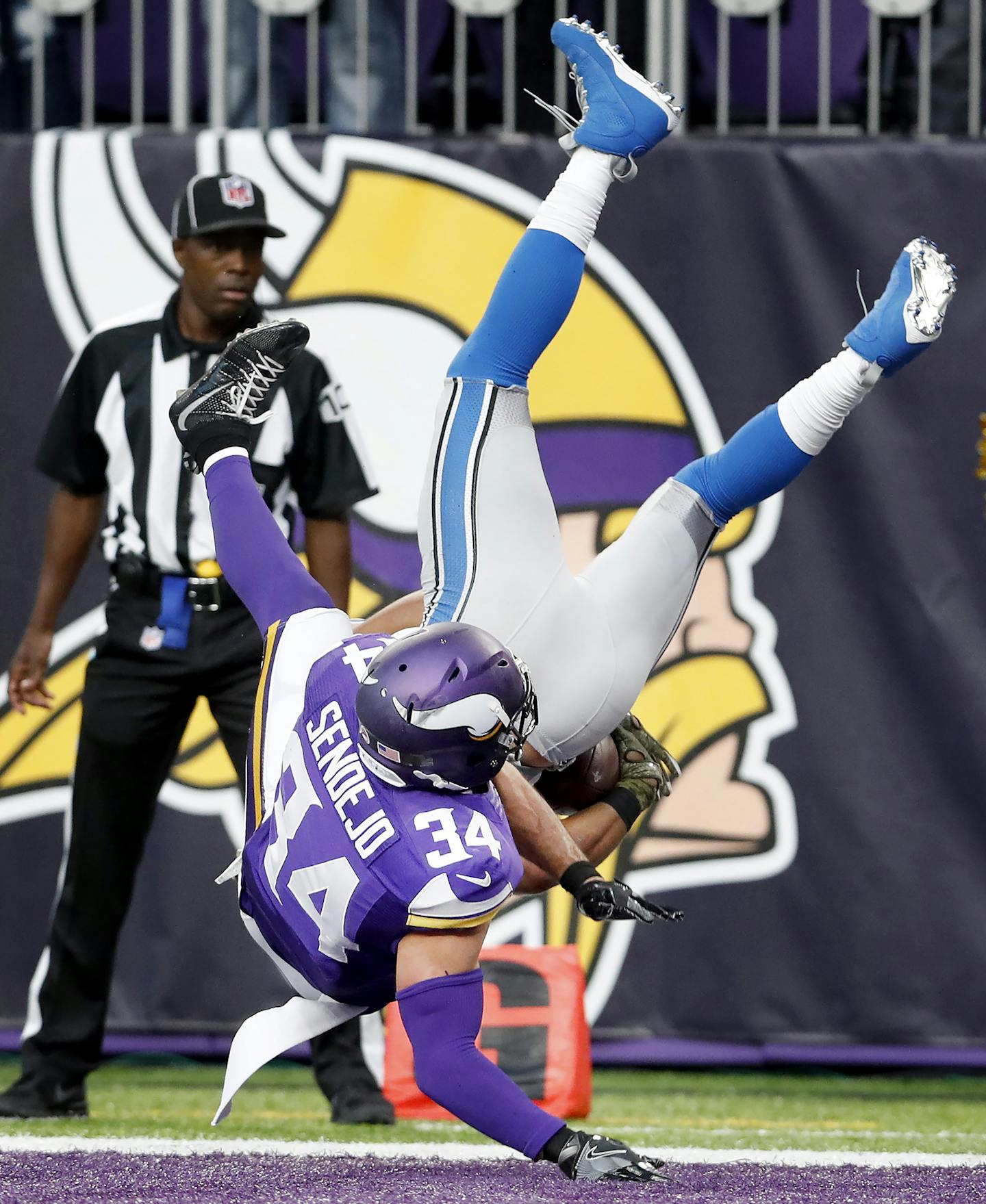 Andrew Sendejo (34) hit Golden Tate (15) as he leapt into the end zone to score the winning touchdown in overtime. Detroit beat Minnesota by a final score of 22-16. ] CARLOS GONZALEZ cgonzalez@startribune.com - November 6, 2016, Minneapolis, MN, US Bank Stadium, NFL, Minnesota Vikings vs. Detroit Lions