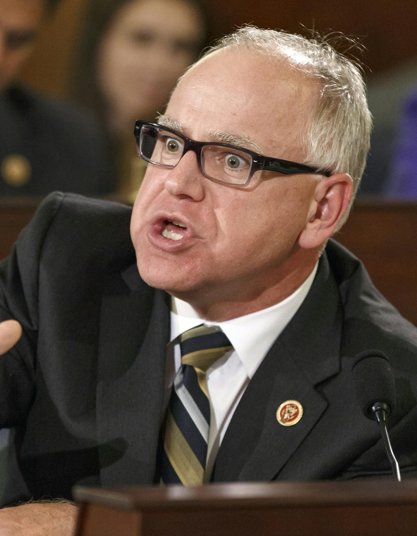 Rep. Tim Walz, D-Minn., a member of the House Committee on Veterans' Affairs, questions witnesses from the Department of Veterans Affairs as the panel investigates allegations of gross mismanagement and misconduct at VA hospitals possibly leading to patient deaths, on Capitol Hill in Washington, Wednesday, May 28, 2014. (AP Photo/J. Scott Applewhite) ORG XMIT: MIN2014052915121880