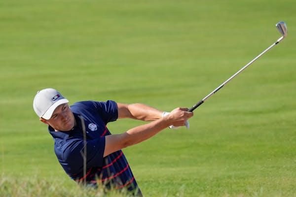 Team USA's Jordan Spieth hits a shot on the 11th hole during a foursome match at the Ryder Cup