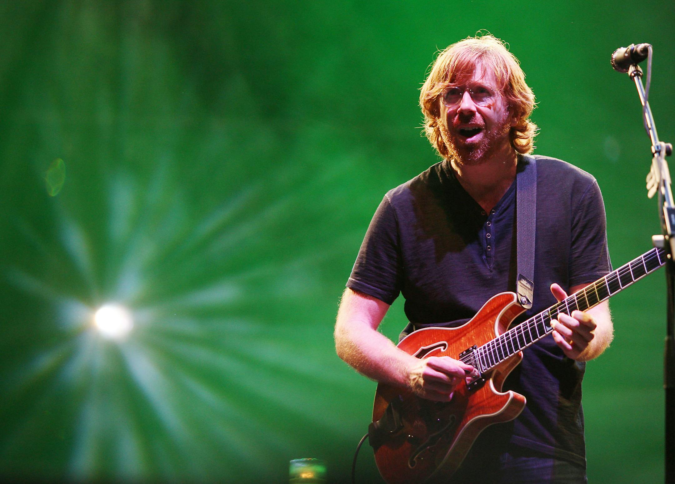 FILE - In this June 12, 2009 file photo provided by Fuse TV via Starpix, Trey Anastasio of the "Jam Band" Phish performs at Bonaroo 2009, in Manchester Tenn.