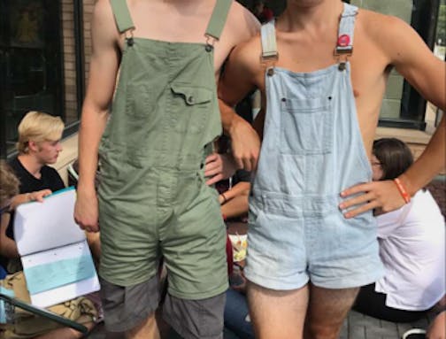 Two male students at Edina High School wore overalls without shirts underneath to protest the rumored changes to the school dress code.