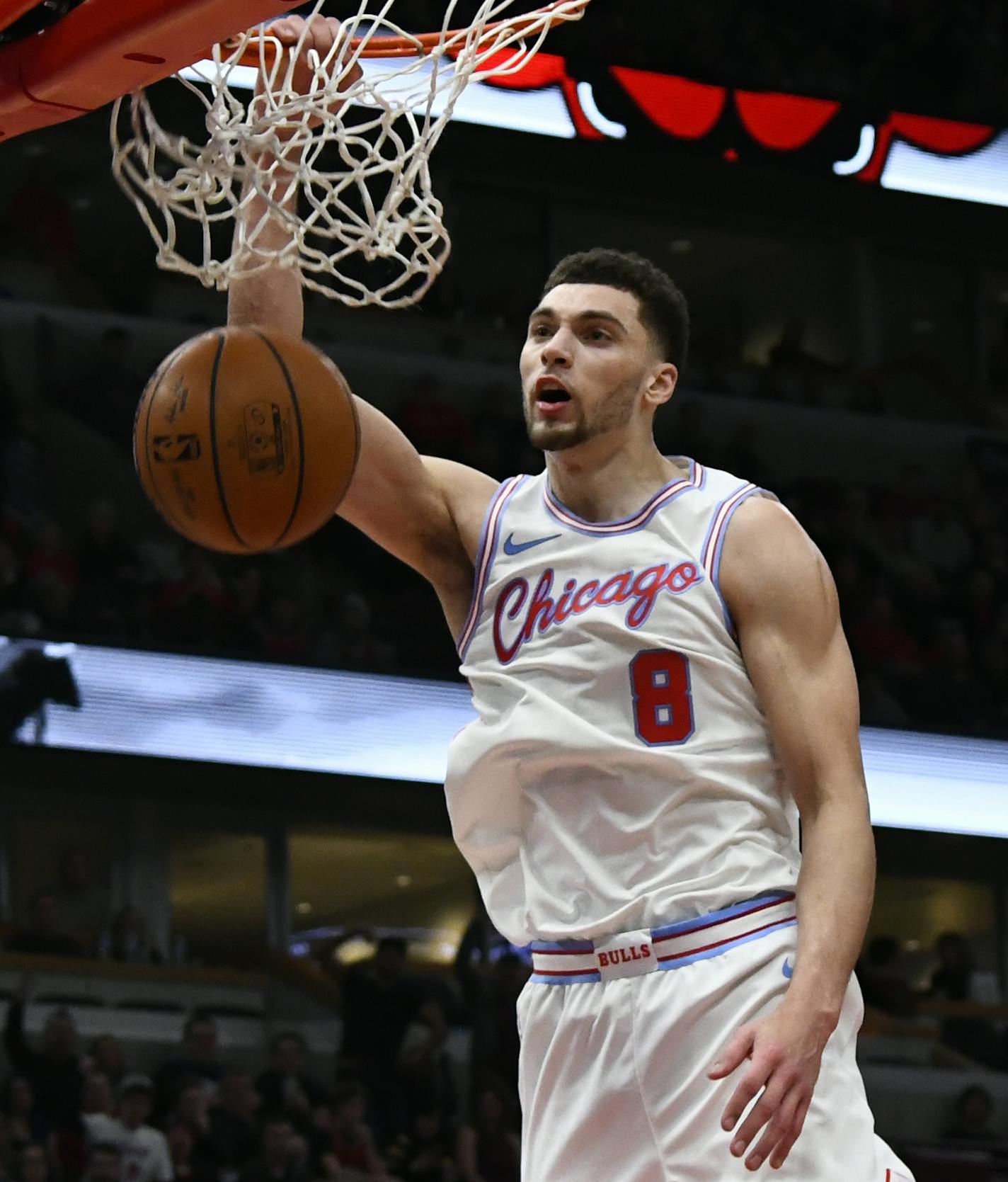 Chicago Bulls guard Zach LaVine dunks against the Minnesota Timberwolves during the second half of an NBA basketball game Friday, Feb. 9, 2018, in Chicago. (AP Photo/Matt Marton)