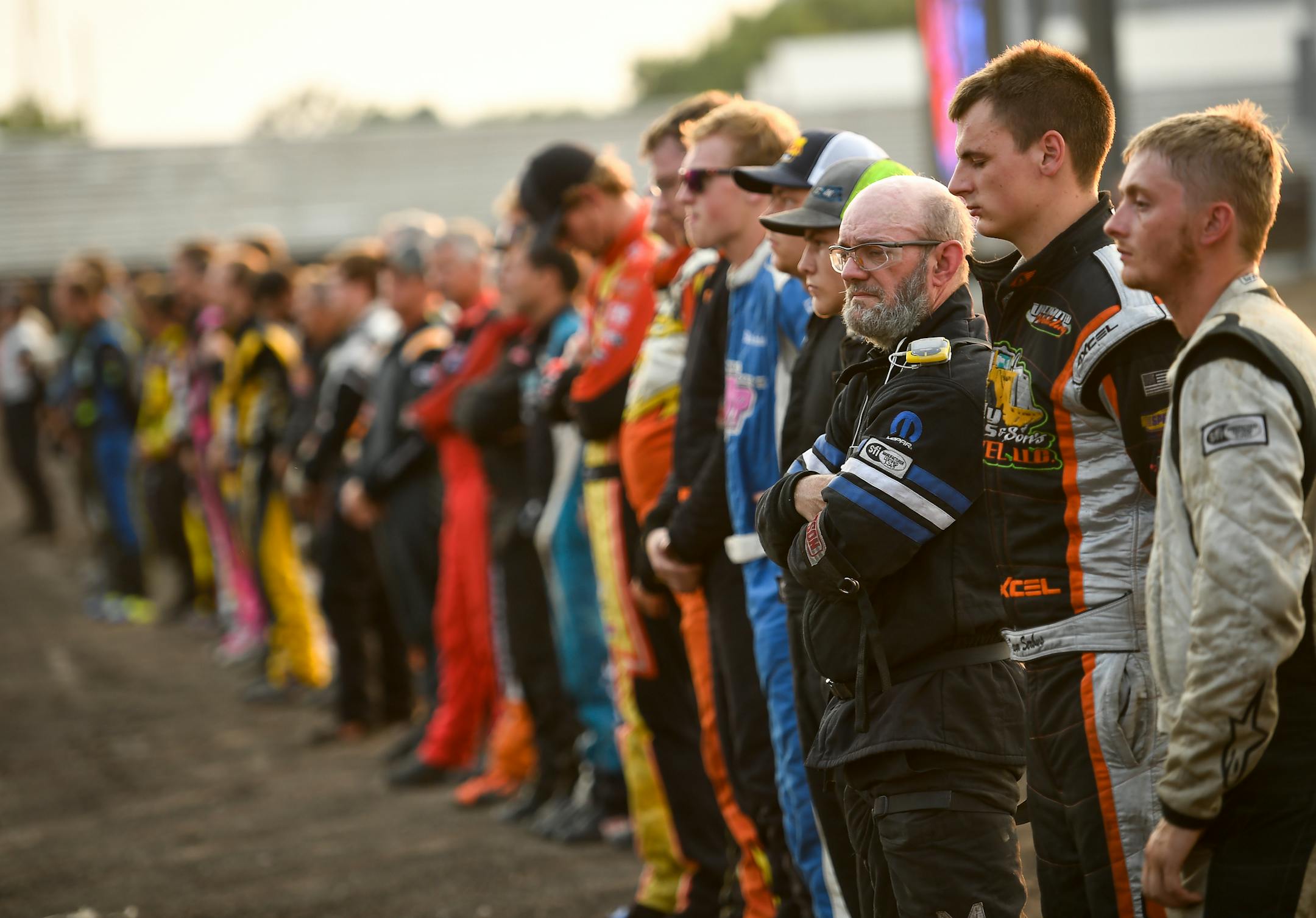 Racers on a recent Friday paused before the competition to honor World of Outlaws driver Jason Johnson, who died in June at a track in Wisconsin.