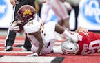 Minnesota's running back Mohamed Ibrahim drove the ball into the end zone for a touchdown during the second quarter as Minnesota took on Ohio State at