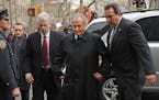 Bernard Madoff arrives at Manhattan federal court for a hearing to discuss potential conflicts of interest between him and his lawyer, Tuesday, March 