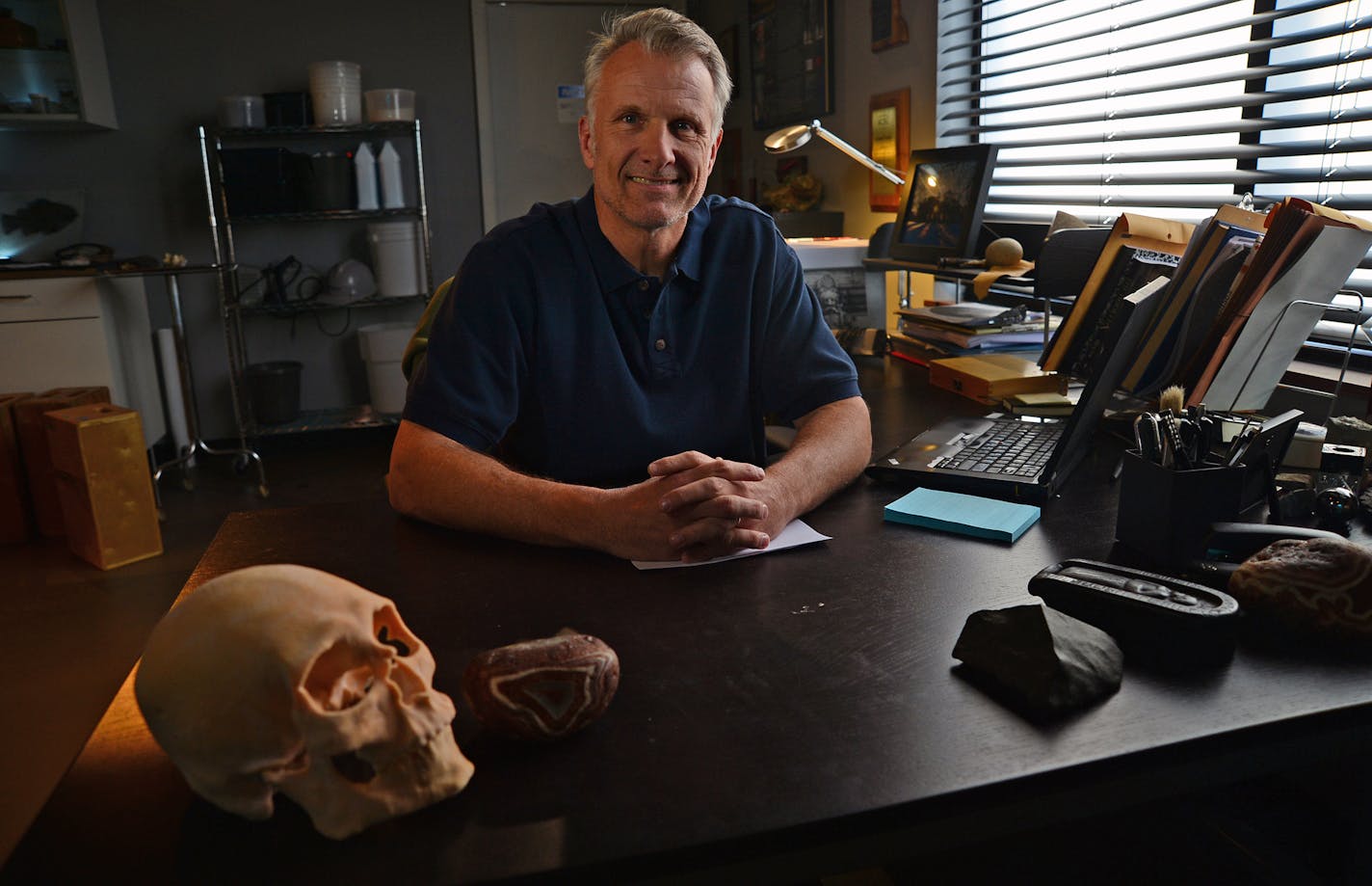 Scott Wolter at his desk on the set of "America Unearthed." ] Scott Wolter, a Chanhassen resident is the host of a successful program on History Channel 2 titled, "America Unearthed." It is produced by the Chaska-based film company, Committee Films Richard.Sennott@startribune.com Richard Sennott/Star Tribune Chaska , Minn. Wednesday 3/12/2014) ** (cq)