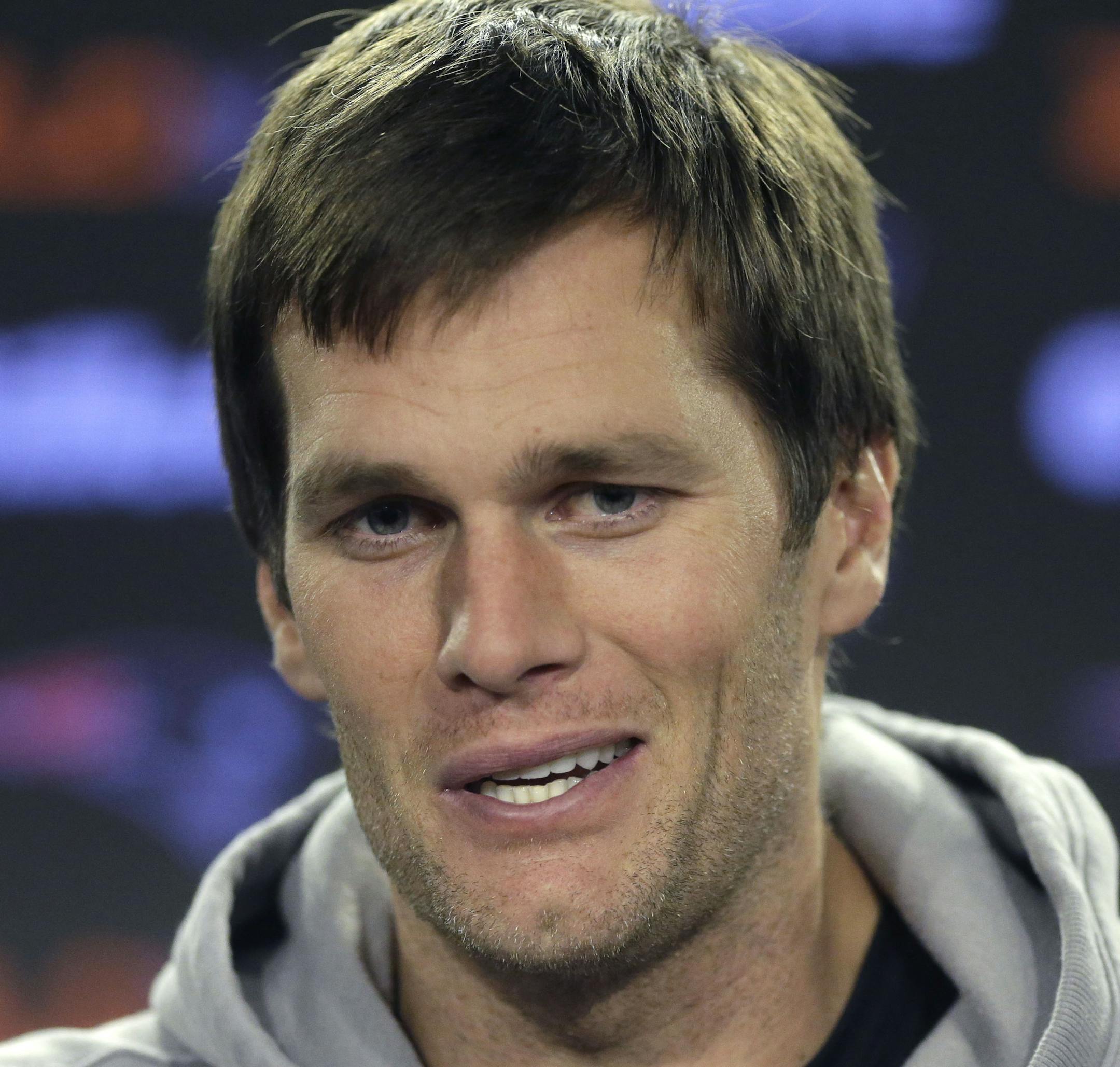 New England Patriots quarterback Tom Brady takes questions from members of the media before an NFL football practice, Tuesday, Jan. 12, 2016, in Foxborough, Mass. The Patriots are to host the Kansas City Chiefs in an NFL divisional playoff game Jan. 16, 2016, in Foxborough. (AP Photo/Steven Senne) ORG XMIT: o28