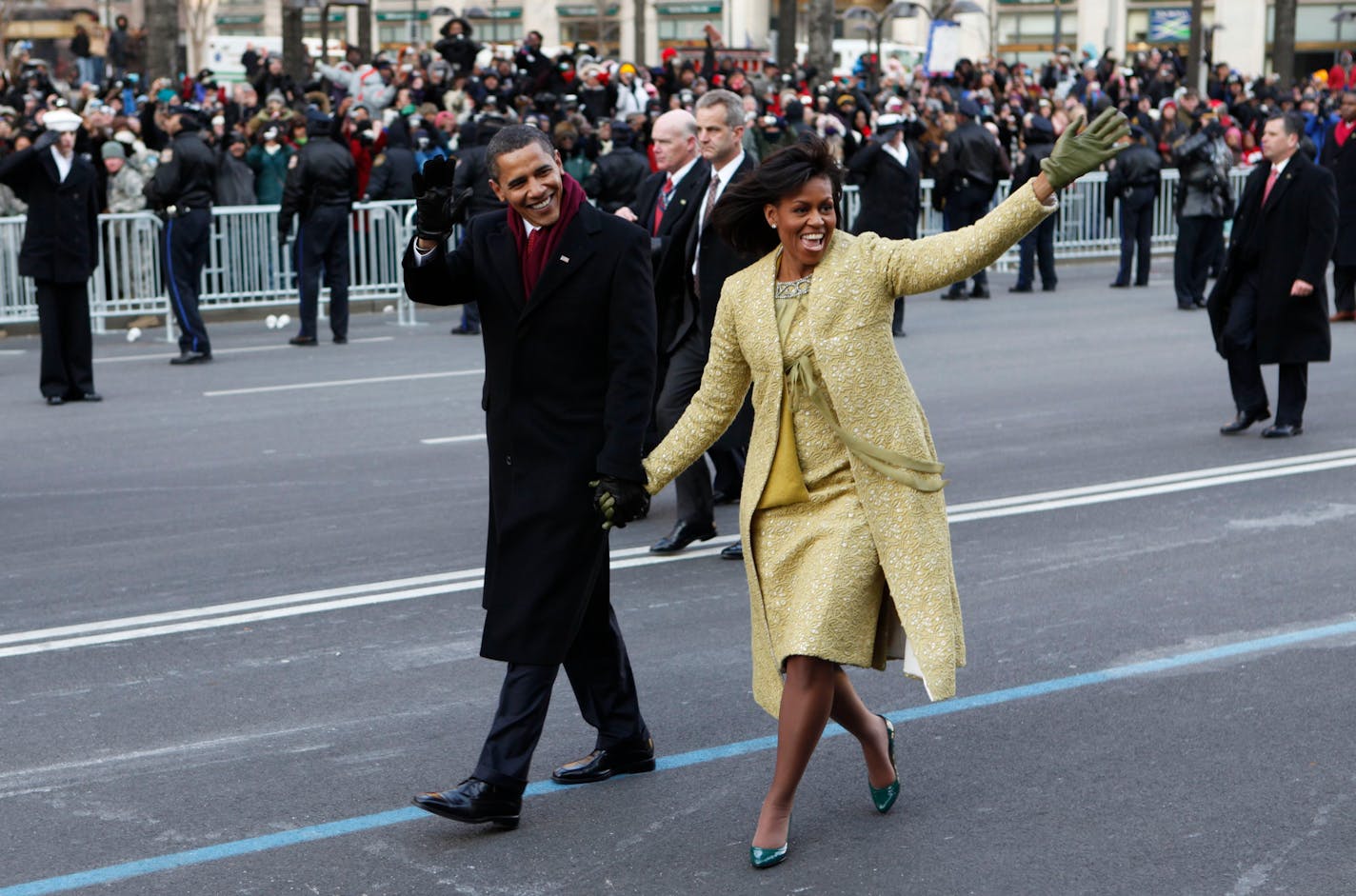 President Barack Obama and first lady Michelle Obama walk the inaugural parade route in Washington, Tuesday, Jan. 20, 2009.