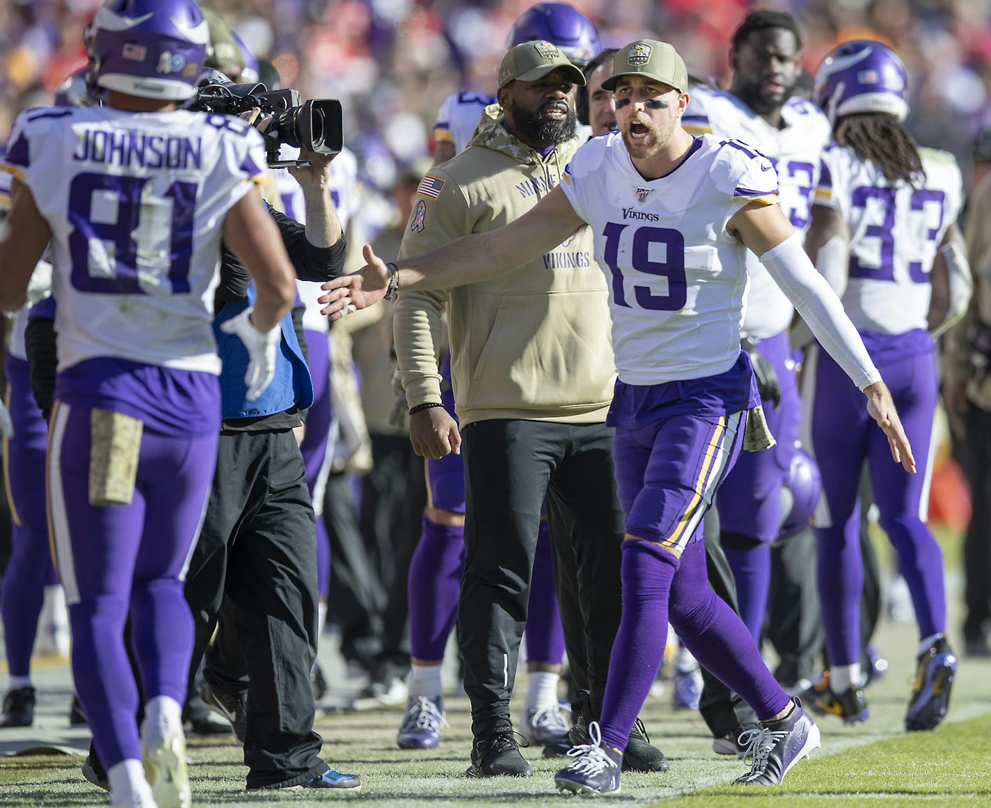 Vikings wide receiver Adam Thielen celebrated from the sideline with wide receiver Bisi Johnson after his touchdown in the fourth quarter. ] ELIZABETH FLORES &#x2022; liz.flores@startribune.com Vikings at Kansas City Chiefs at Arrowhead Stadium, Sunday, November 3, 2019 in Kansas City, MO.