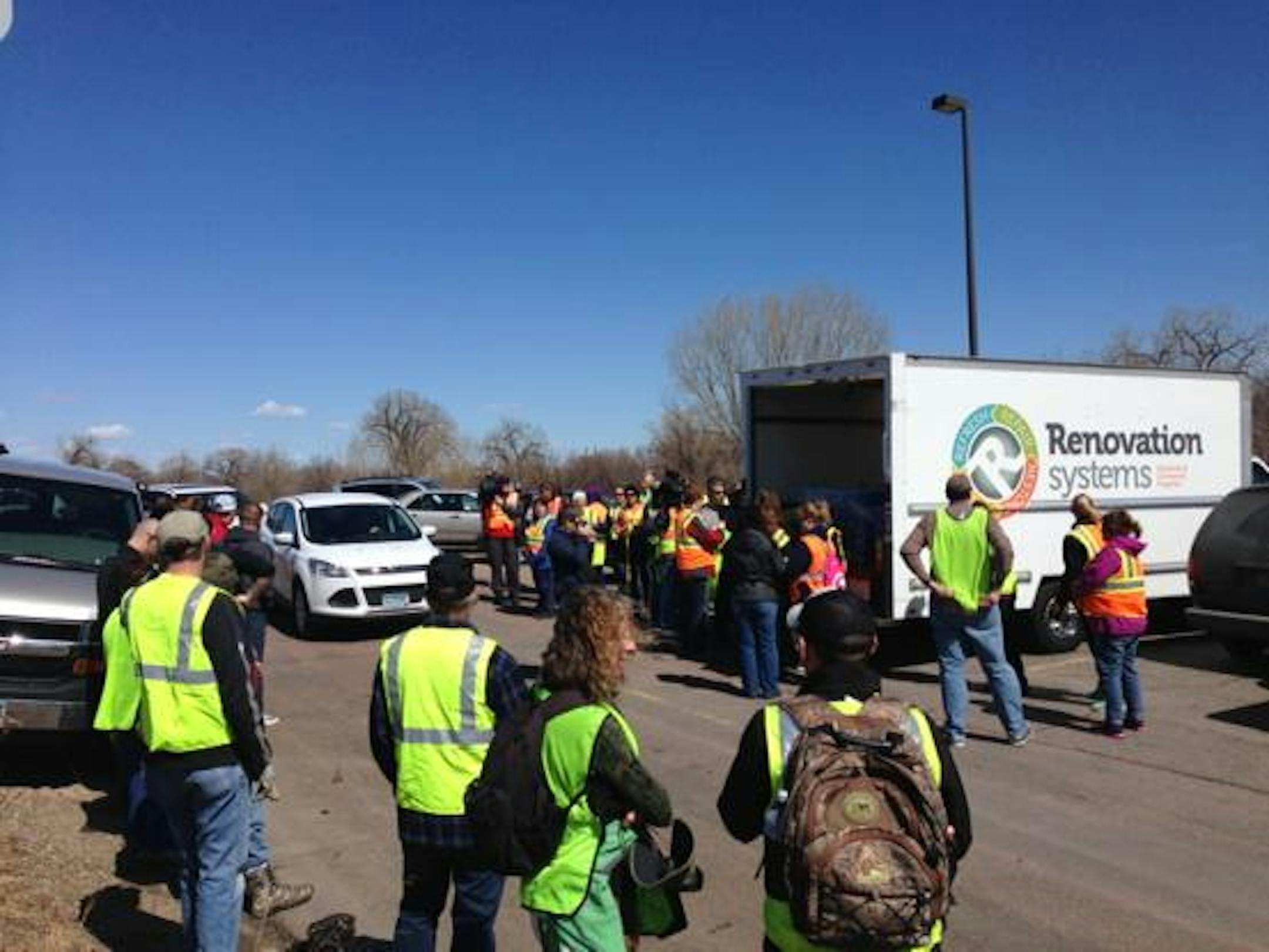 Volunteers gathered Thursday to search for missing Crystal boy Barway Collins.