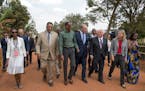The Rev. Jesse Jackson, Rwandan president Kagame, Coca-Cola CEO Muhtar Kent and Pentair CEO Randy Hogan celebrated the opening of a new "Ekocenter" in