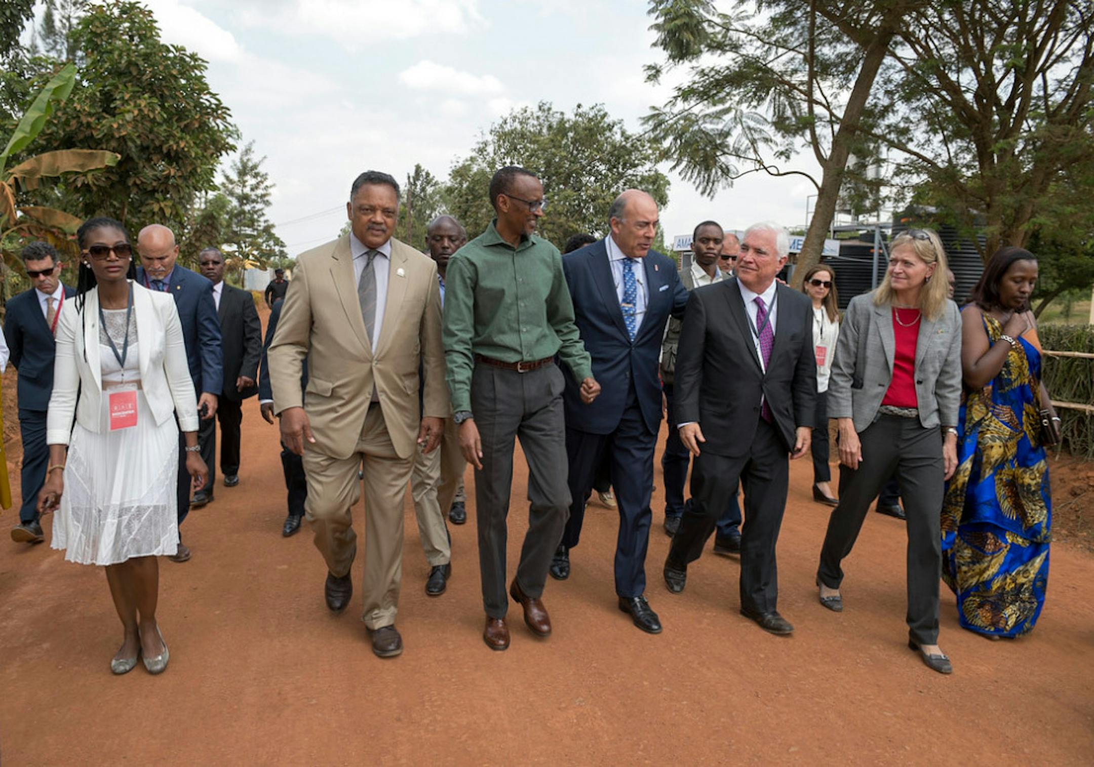 The Rev. Jesse Jackson, Rwandan president Kagame, Coca-Cola CEO Muhtar Kent and Pentair CEO Randy Hogan celebrated the opening of a new "Ekocenter" in the rural village of Ruhunda that brings clean water and Internet services to the village for the first time. Pentair is providing the water filtration equipment.