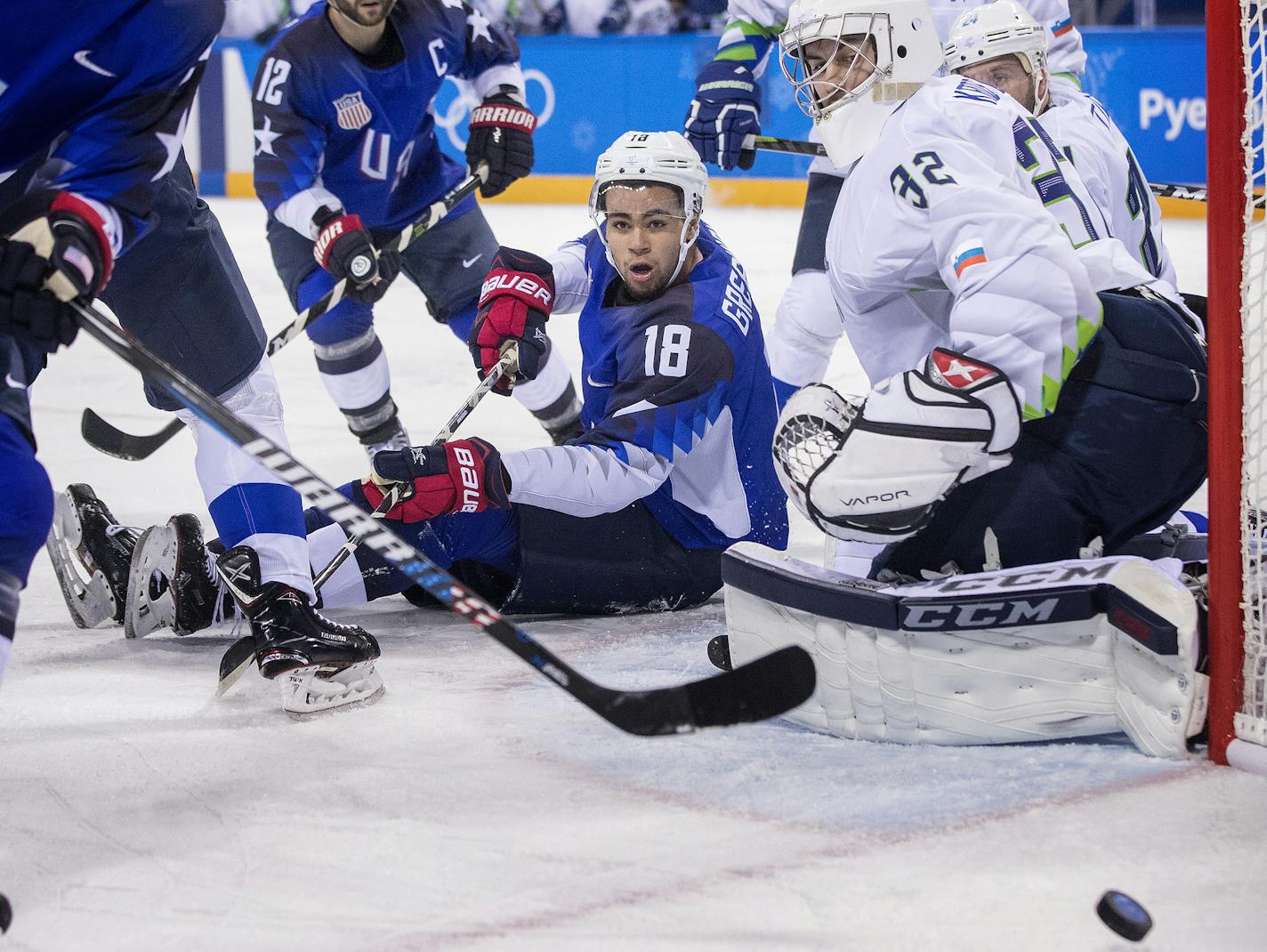 Men's Hockey, Kwangdong Hockey Center, USA vs. Slovenia. Jordan Greenway (18) and goalie Gasper Kroselj (32) kept their eyes on the puck in the first period, on February 14, 2018, at the Winter Olympics in South Korea, Pyeongchang.
(Carlos Gonzalez/Minneapolis Star Tribune/TNS) ORG XMIT: 1223653