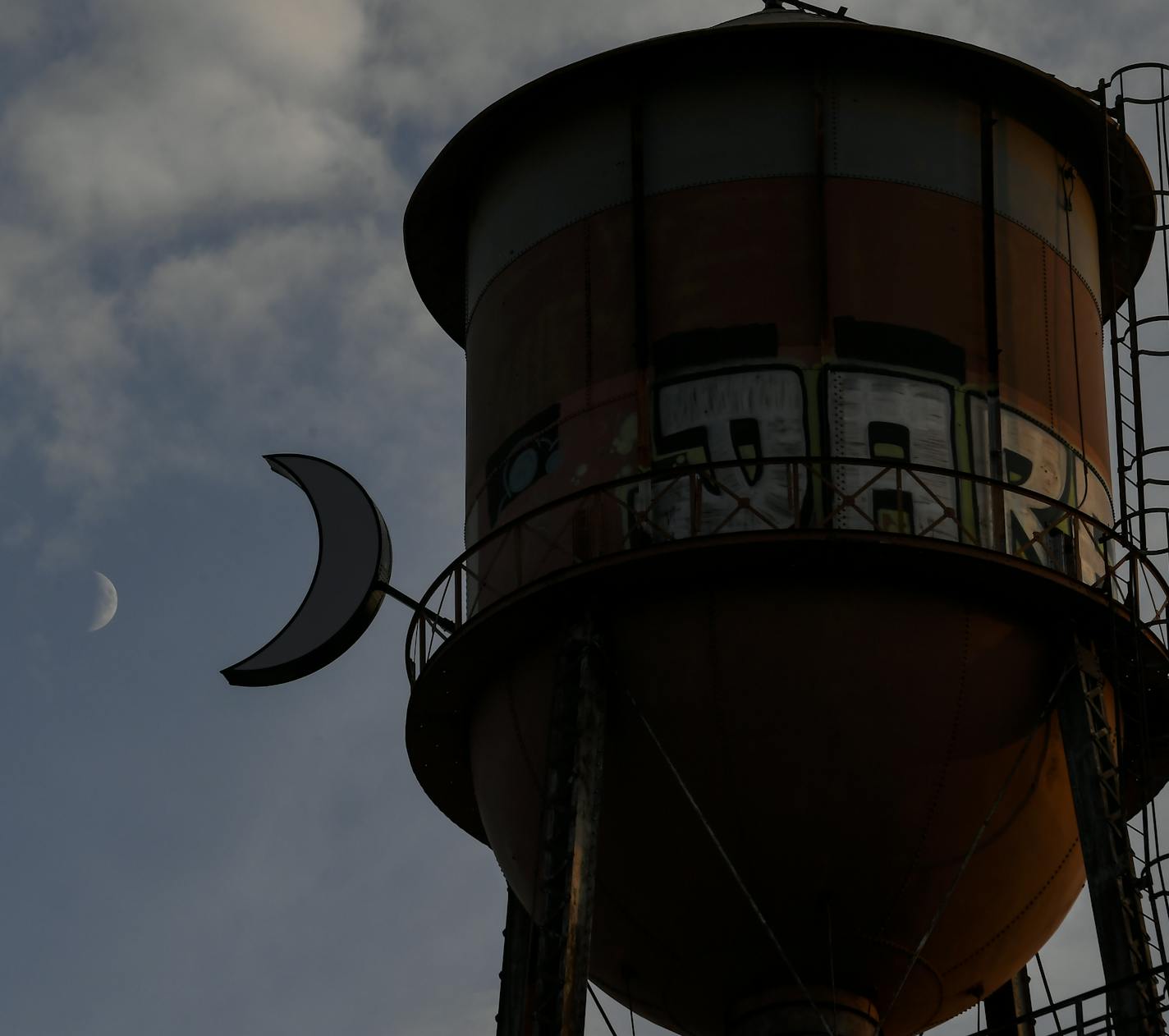 A rising moon in a waxing crescent phase rose behind Vandalia Tower Thursday night. ] AARON LAVINSKY &#x2022; aaron.lavinsky@startribune.com Over the past couple years, a corner of St. Paul running along the Green Line from Prior Avenue west to Hwy. 280 has been quietly booming. St. Paul's Creative Enterprise Zone, featuring an eclectic mix of potters and playwrights, builders and brewpubs, is home to businesses employing more than 43,000 people and has a heftier tax base than downtown St. Paul.