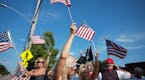 Supporters of the Pledge of Allegiance waved the flag in front of St. Louis Park City Hall.] The St. Louis Park City Council will hold a study session
