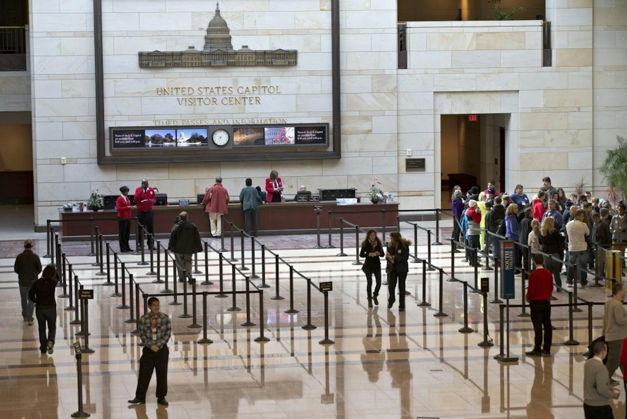Tourists line up at the Capitol Visitors Center on Capitol Hill in Washington, Thursday, March 7, 2013. House Speaker John Boehner of Ohio said Thursday that the Capitol would remain open for all to see and that the decision by the Obama Administration to cancel tours of the White House due to the sequester was silly, essentially a political gimmick.