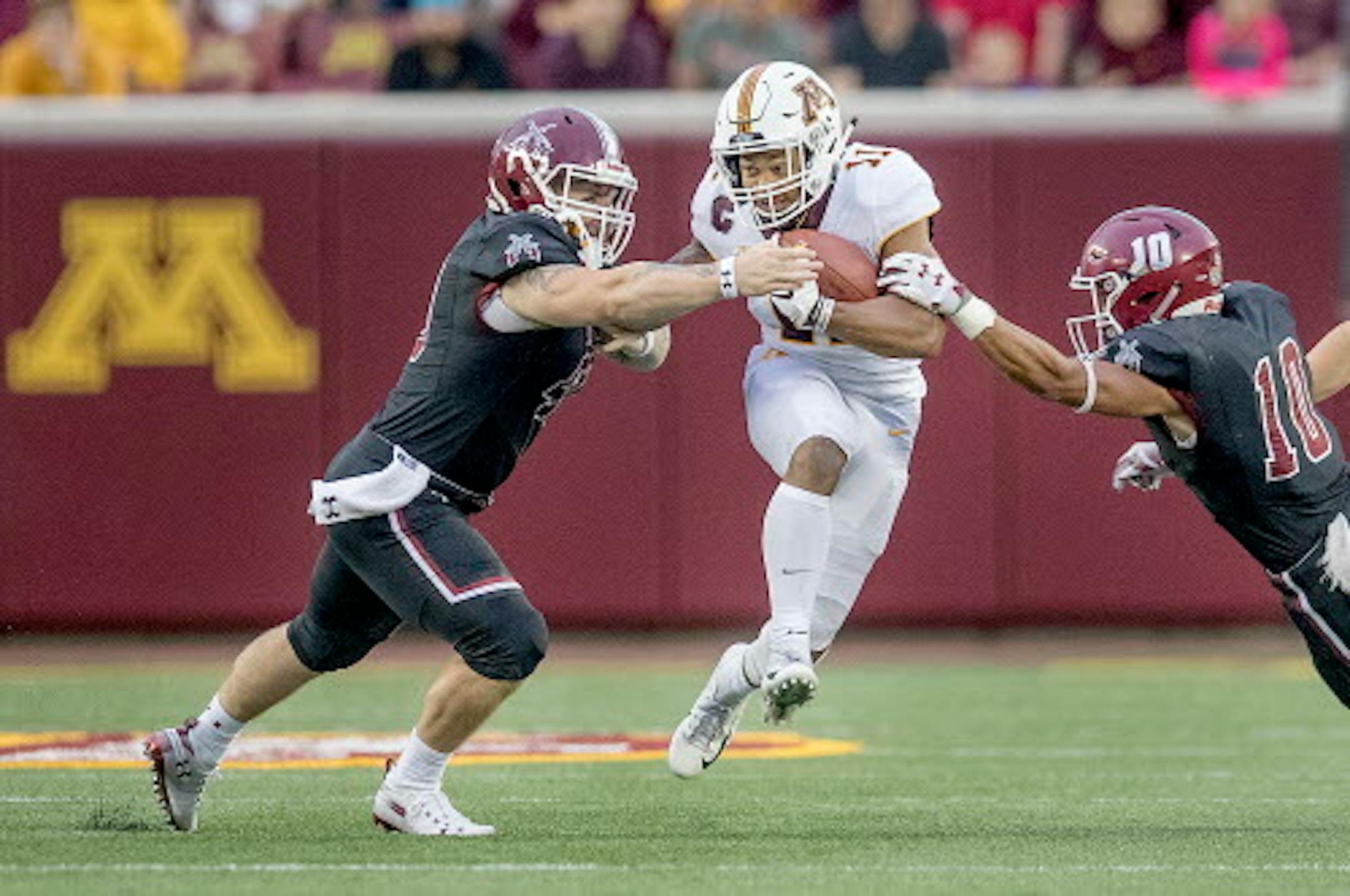 Minnesota's defensive back Antoine Winfield Jr. broke away from New Mexico's defense to return the ball 76 yards for a touchdown in the second quarter Minnesota took on New Mexico State at TCF Bank Stadium, Thursday, August 30, 2018 in Minneapolis, MN.    ]  ELIZABETH FLORES ' liz.flores@startribune.com