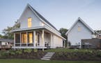 Sara and Jeremy Imhoff's new home is a twist on tradition with a classic gable and porch on the outside and a clean modern aesthetic on the inside.