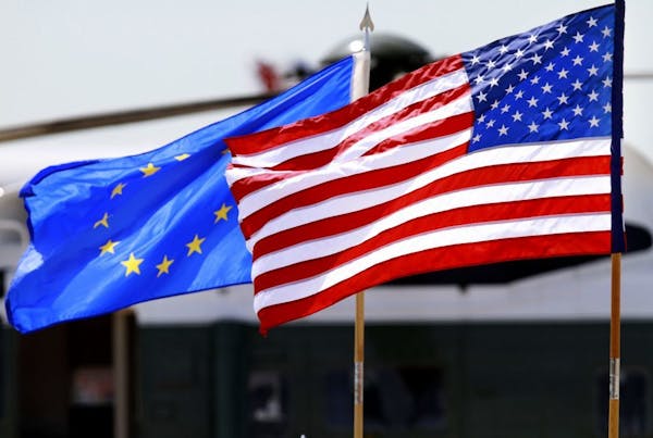 U.S. and European Union flags.