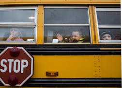Students sit on the bus at the end of the school day at Eastview Elementary School in Lakeville on Wednesday, November 11, 2015. ] (LEILA NAVIDI/STAR 