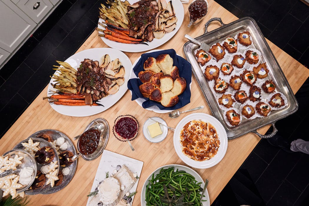 A spread of favorite holiday recipes prepared by Zoë François and Andrew Zimmern for their upcoming special.