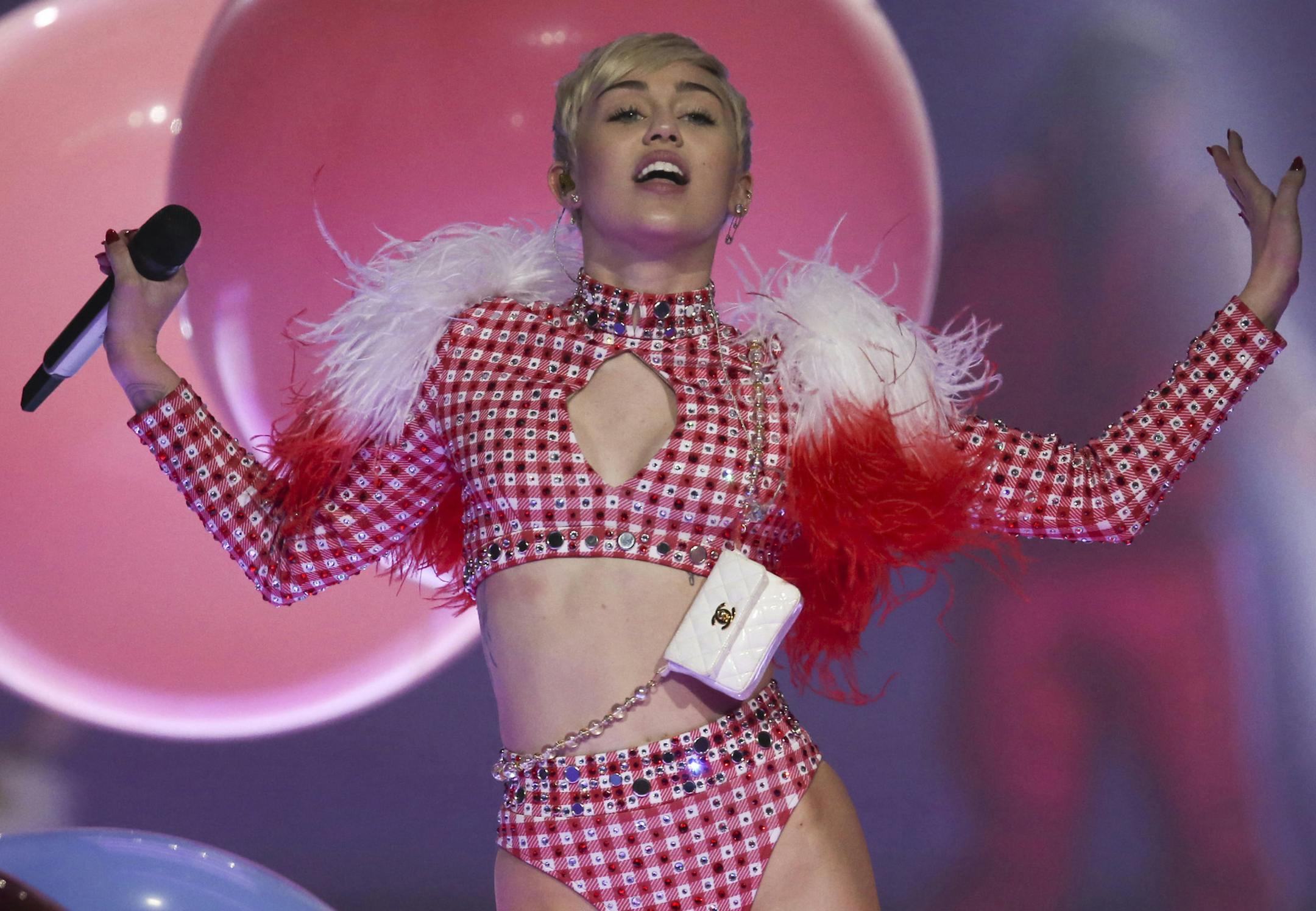 March 10, 2014: Miley Cyrus performing "4 x 4" Xcel Energy Center in St. Paul.
