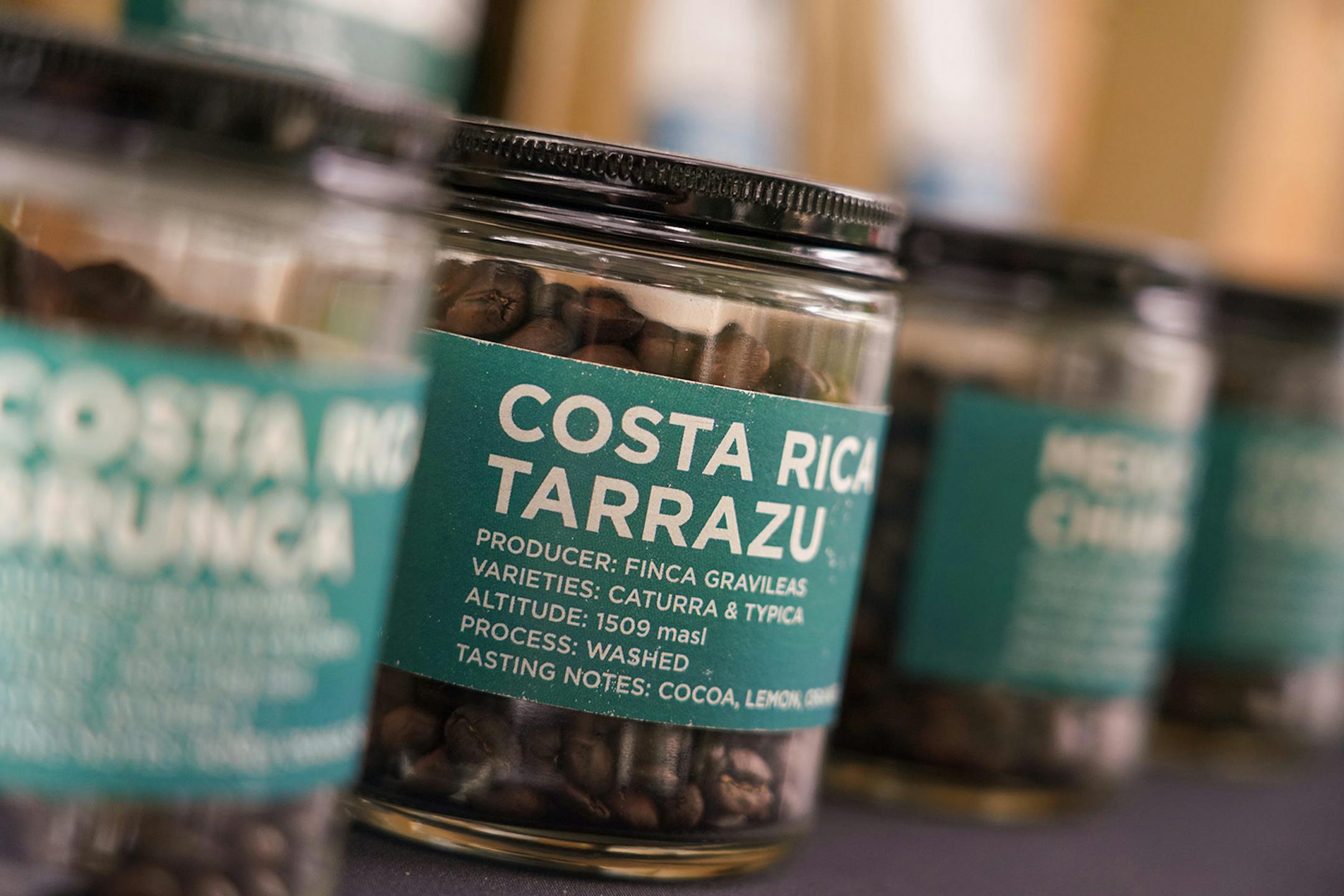 Gourmet Tarrazu coffee at the Jordan Tomb's tent at the Bellevue Farmers Market on Friday, July 9, 2021. Jordan Tomb's is an organic coffee and tea company dedicated to promoting artists, designers and other creative people as well as sustainable business practices. (Steve Mellon/Pittsburgh Post-Gazette/TNS) ORG XMIT: 24415172W