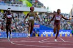 Sha'Carri Richardson celebrates her win in the wins women's 100-meter run final during the U.S. Track and Field Olympic Team Trials in Eugene, Ore., o