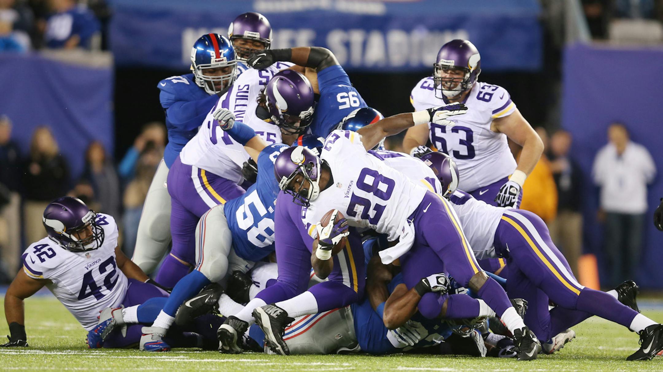 Vikings running back Adrian Peterson was stopped at the line of scrimmage in the second quarter.