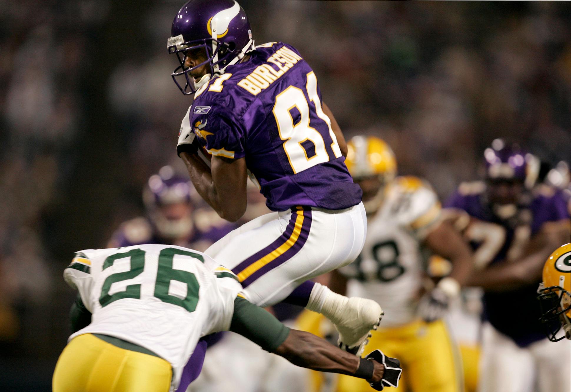 Nate Burleson caught a pass during a 2005 game against the Green Bay Packers at the Metrodome in Minneapolis.