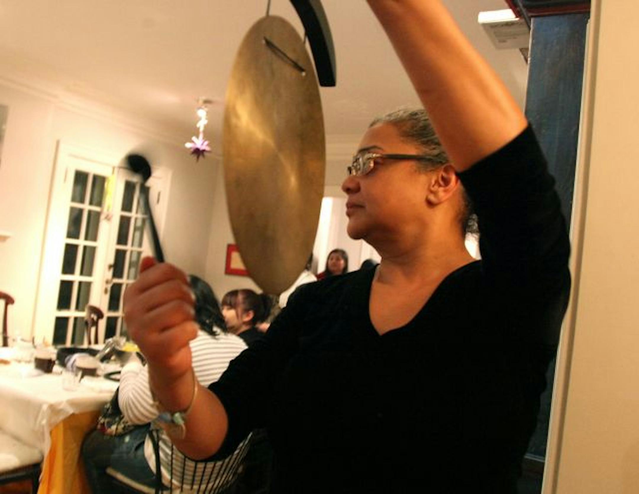 Marnita Schroedl called a meeting to order between teens and health workers discussing solutions to rising STD rates.