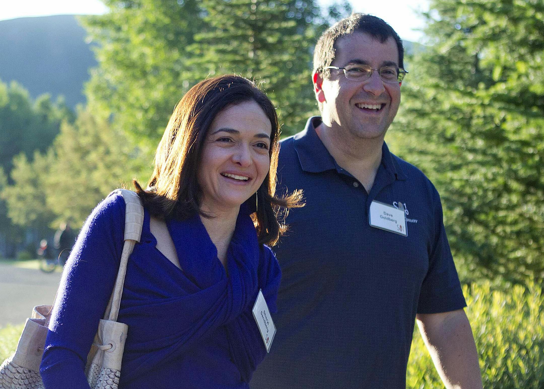 FILE - In this July 6, 2011 file photo, Facebook COO Sheryl Sandberg, left, and her husband, David Goldberg, CEO of SurveyMonkey, arrive at the Sun Valley Inn for the Allen and Co. Sun Valley Conference, in Sun Valley, Idaho. Sandberg on Wednesday, June 3, 2015 took to her Facebook page to mark the end of a period of intense mourning following the May 1 death of her husband by saying "I want to choose life and meaning." (AP Photo/Julie Jacobson, File)