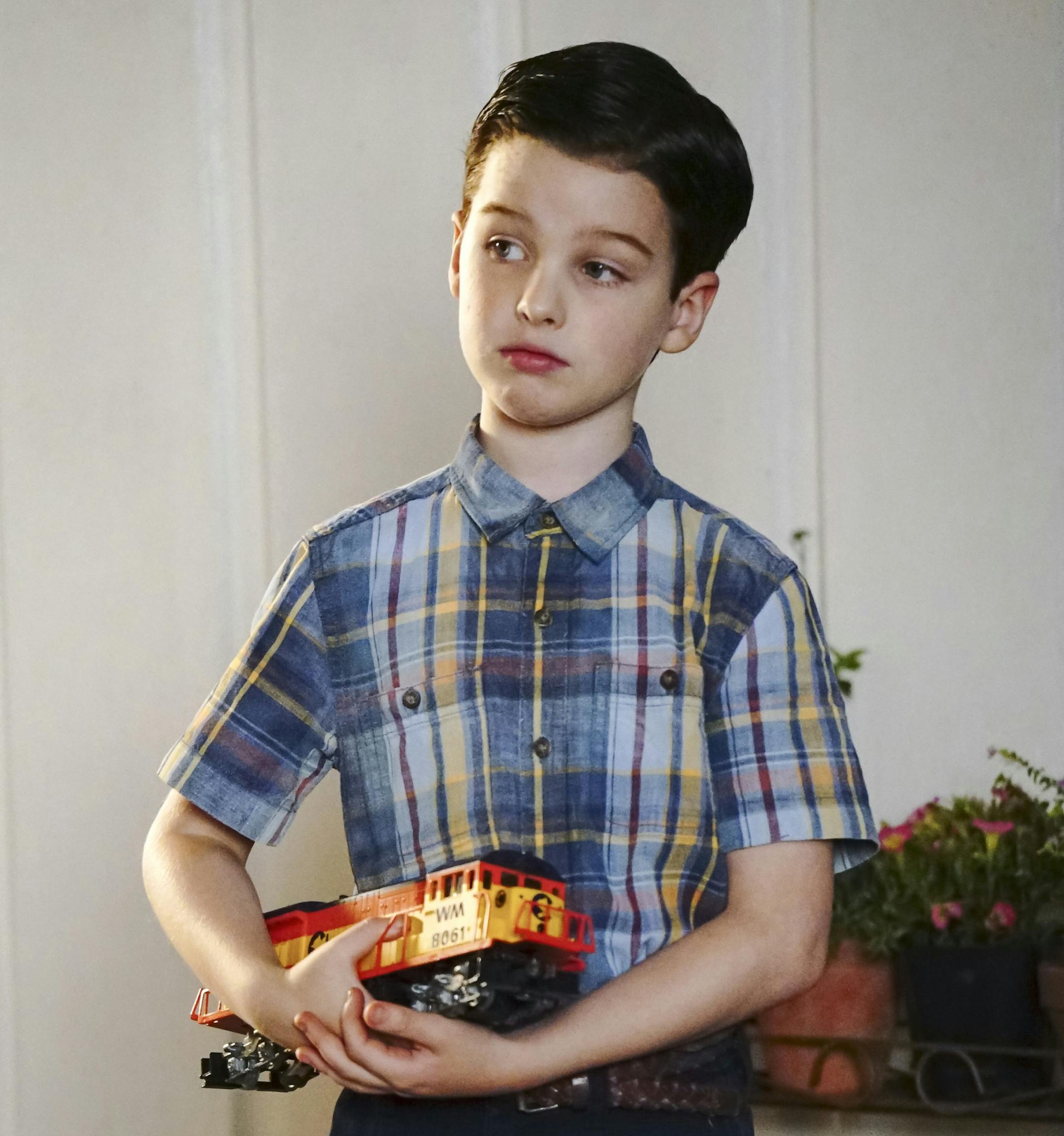 "Spock, Kirk, and Testicular Hernia" -- Pictured: Sheldon (Iain Armitage). George Sr. strikes a deal with Sheldon to tutor Georgie when poor grades threaten to keep him from playing football, on YOUNG SHELDON, Thursday, Dec. 21 (8:31-9:01 PM, ET/PT) on the CBS Television Network. Photo: Bill Inoshita/CBS Ã?Â©2017 CBS Broadcasting, Inc. All Rights Reserved.