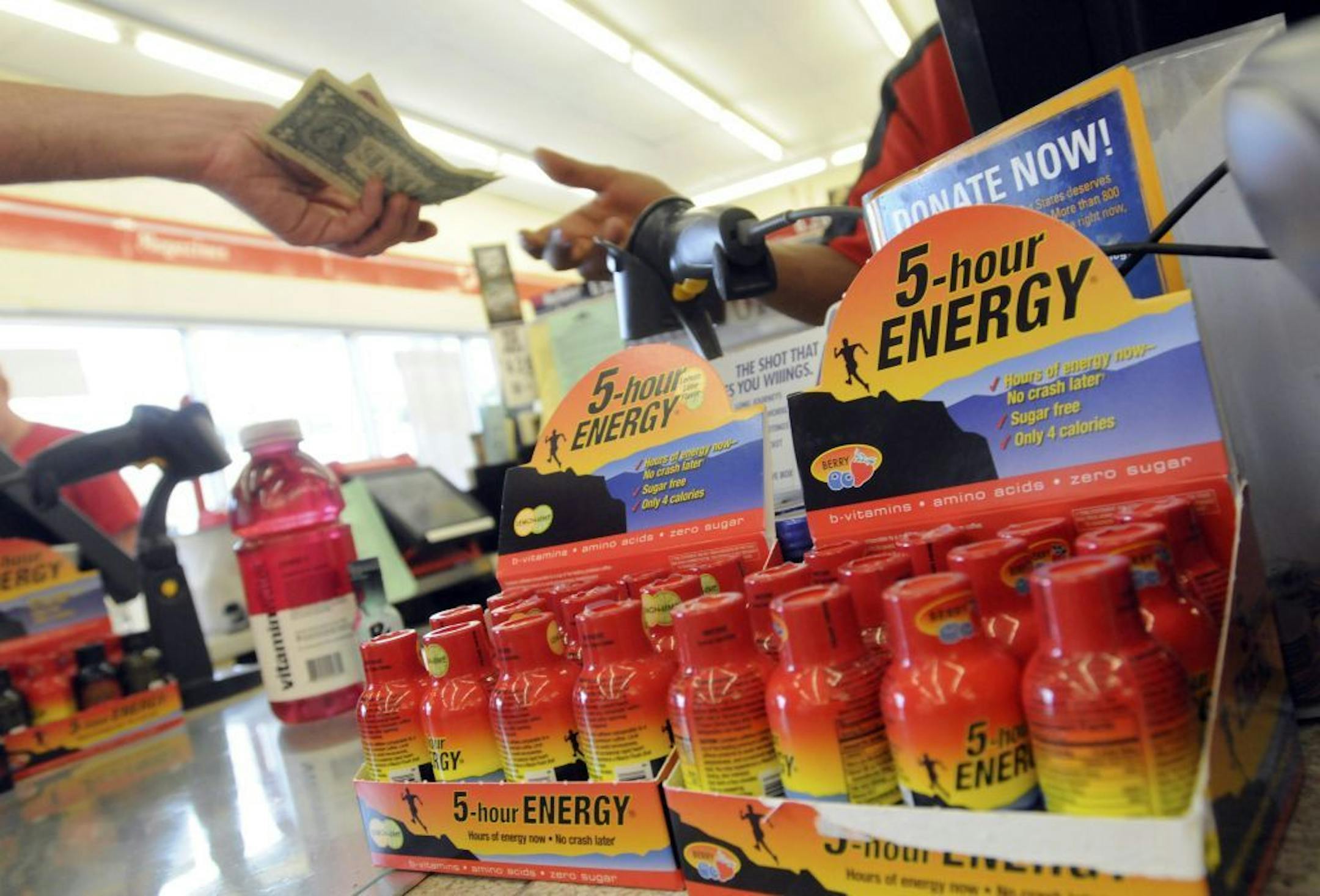 FILE -- A 5-Hour Energy drink display at a convenience store, in College Park, Md., July 1, 2009. The high-caffeine energy drink has been cited as possibly being involved in 13 deaths, according to Food and Drug Administration records released in November 2012.