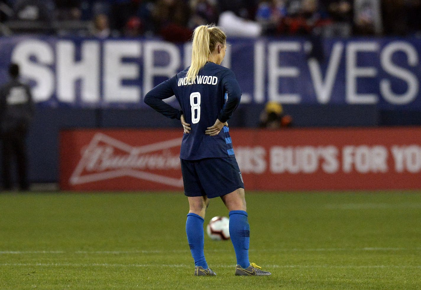 U.S. midfielder Julie Ertz stands on the pitch after the team's 2-2 draw against England in a SheBelieves Cup match on March 2 in Nashville, Tenn. Ertz honors Carrie Underwood by wearing her name on the back of her jersey.