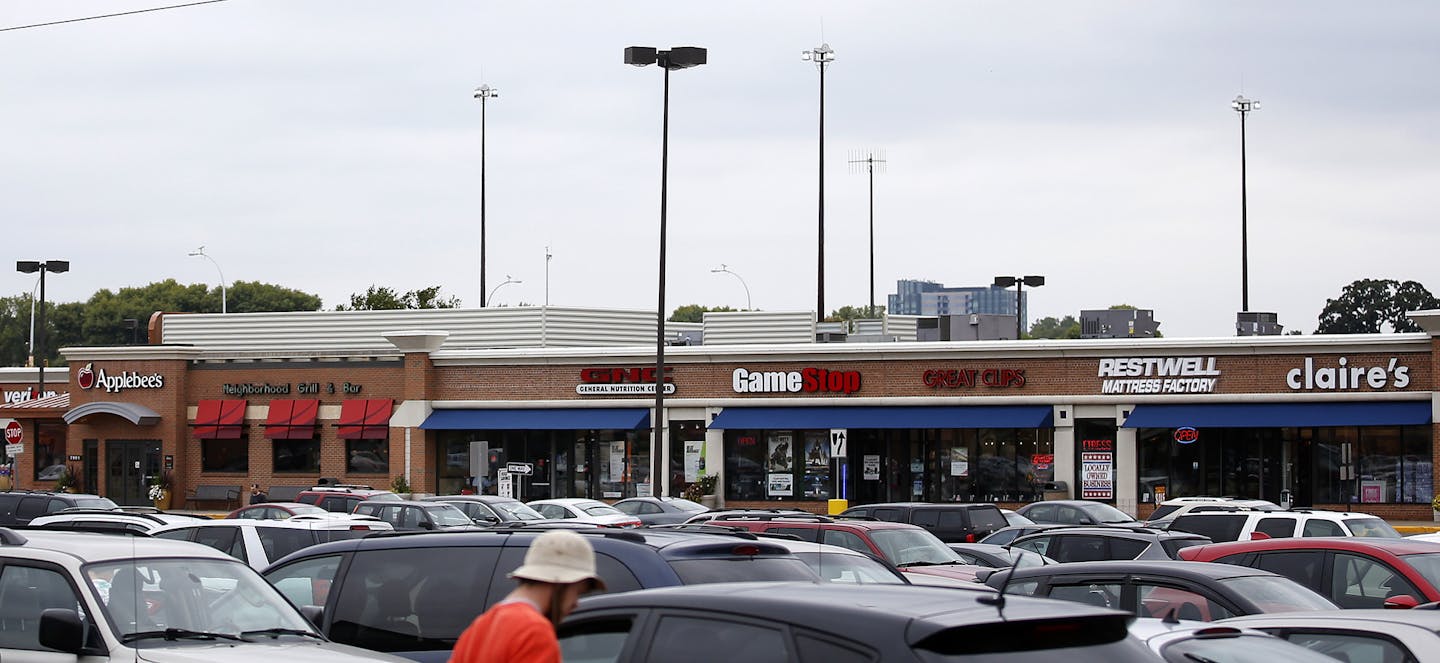 The Southtown Shopping Center in Bloomington on Tuesday afternoon. ] CARLOS GONZALEZ cgonzalez@startribune.com - September 9, 2014, Bloomington, Minn., Southtown was one of the Twin Cities' earliest suburban shopping centers, and it's always been happy to operate on a smaller scale than some of its competitors. But now the owner, Kraus -Anderson, says it's being "railroaded" by the city of Bloomington and the Met Council.