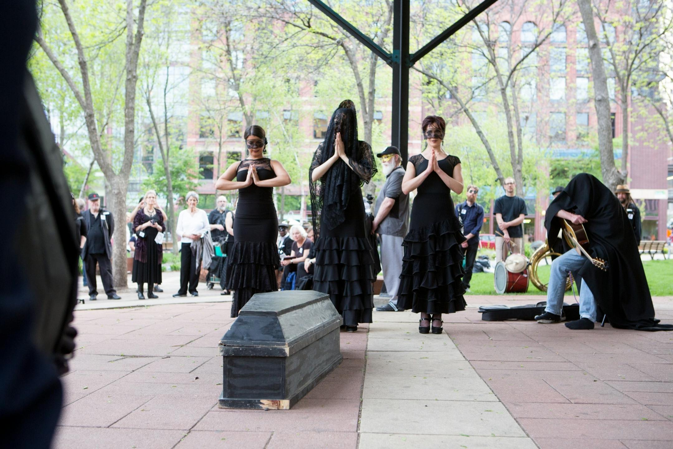A ceremonial dance in honor of the Jax Building in Mears Park Friday evening.