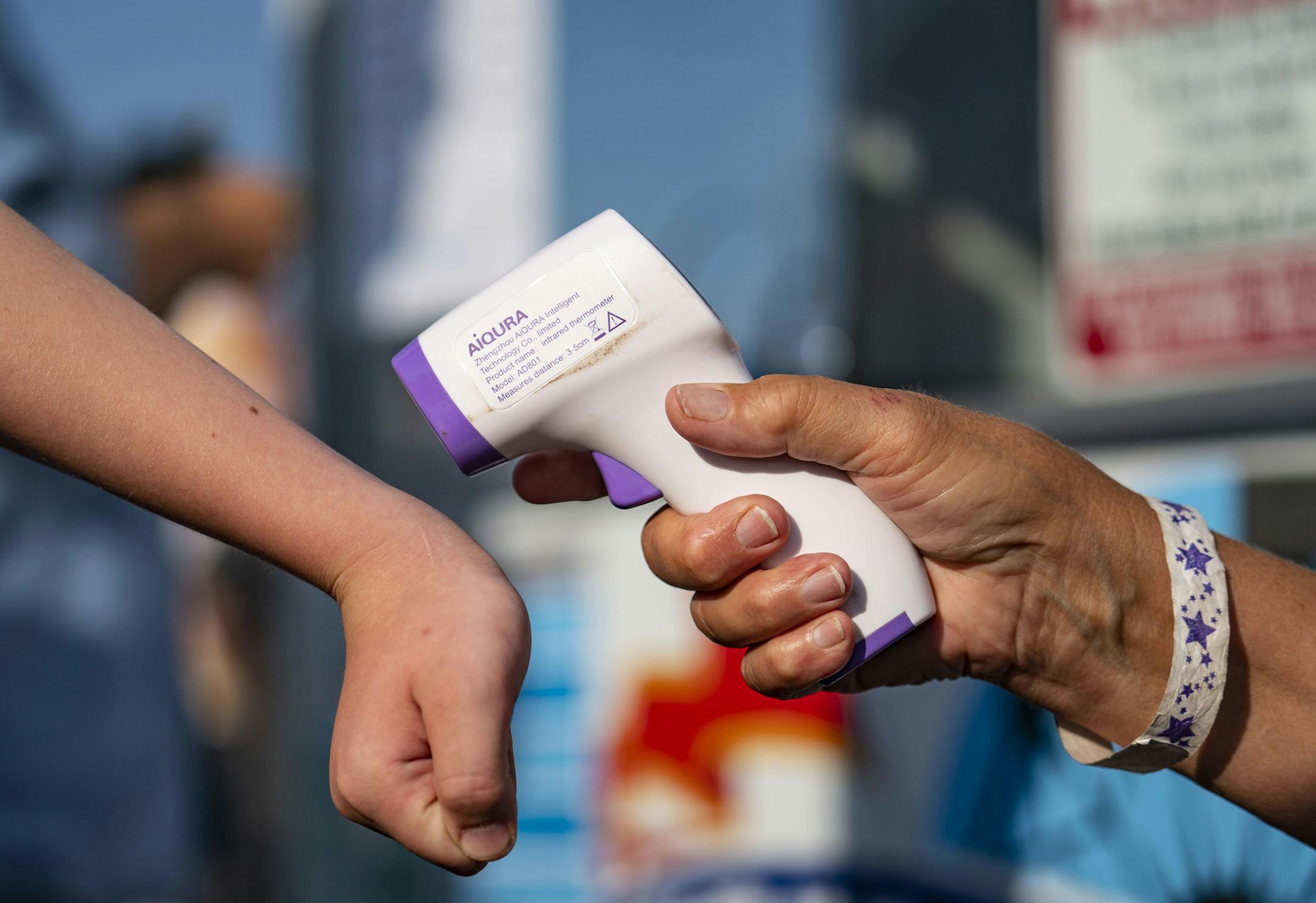 All fairgoers were subjected to a wrist temperature check before entering the fairgrounds on Friday. ] ALEX KORMANN • alex.kormann@startribune.com Head of the Lakes Fair went on business as usual in Superior, WI this week including Friday July 24, 2020. It was complete with races, livestock auctions, rides and games. Masks were strongly recommended but not required. Temperature checks were done at the gate and anyone with a fever over 100 degrees was turned away.