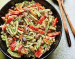 Serve Pistachio Pasta Salad with Tomatoes, Olives and Red Onion on its own or with grilled chicken. From From “Flavor,” by Sabrina Ghayour (Aster,