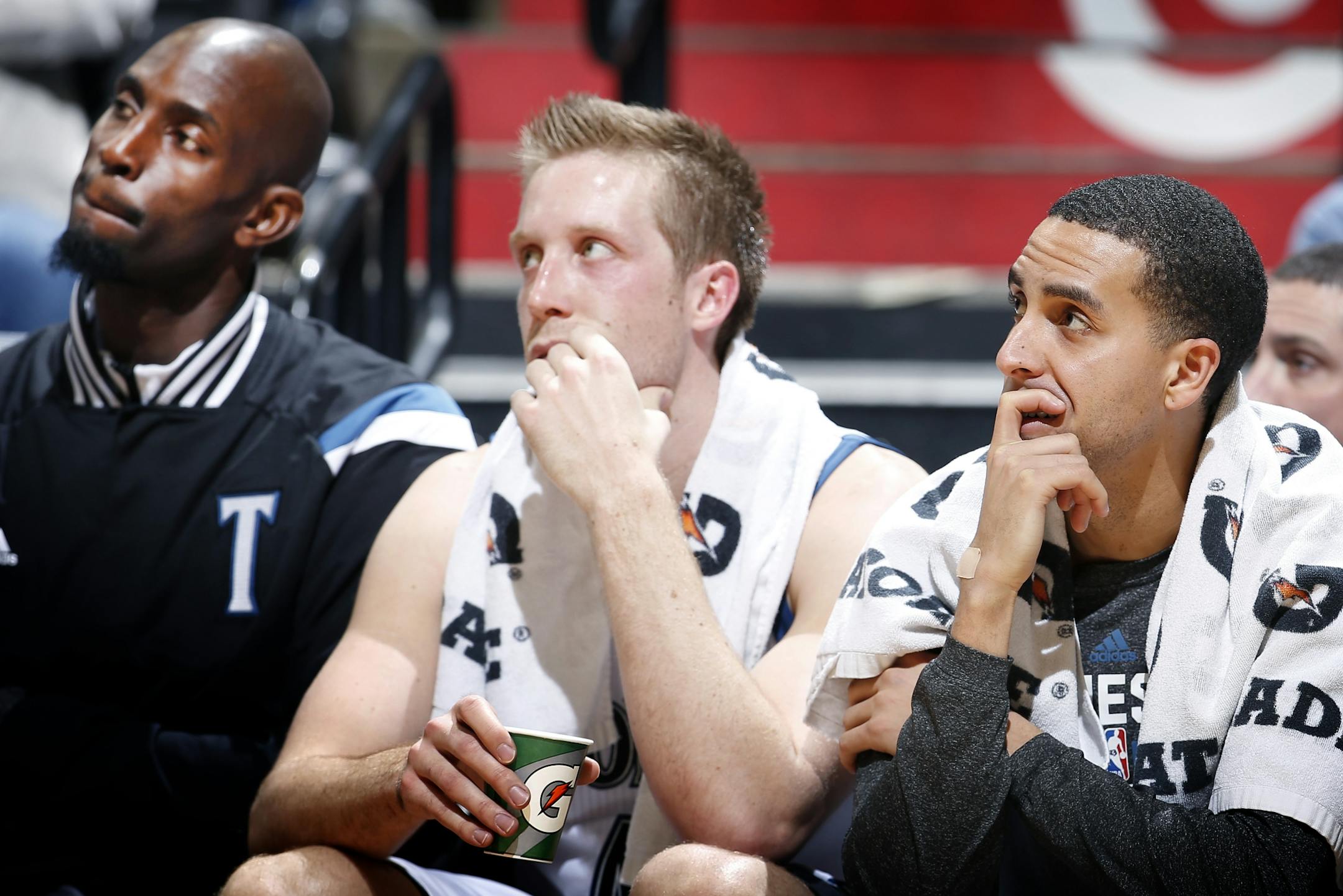 Timberwolves Kevin Garnett, Justin Hamilton and Kevin Martin watched the game in the final minute of play. Brooklyn beat Minnesota by a final score of 122-106.