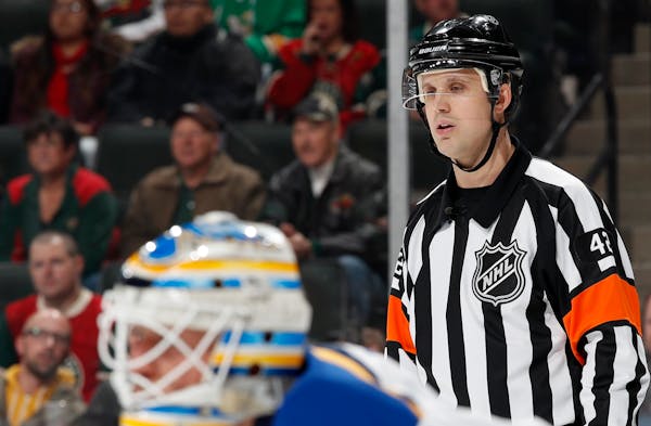 Former Minnesota State Mankato player Jake Brenk is one of nine referees splitting between the NHL and AHL. ] CARLOS GONZALEZ cgonzalez@startribune.co