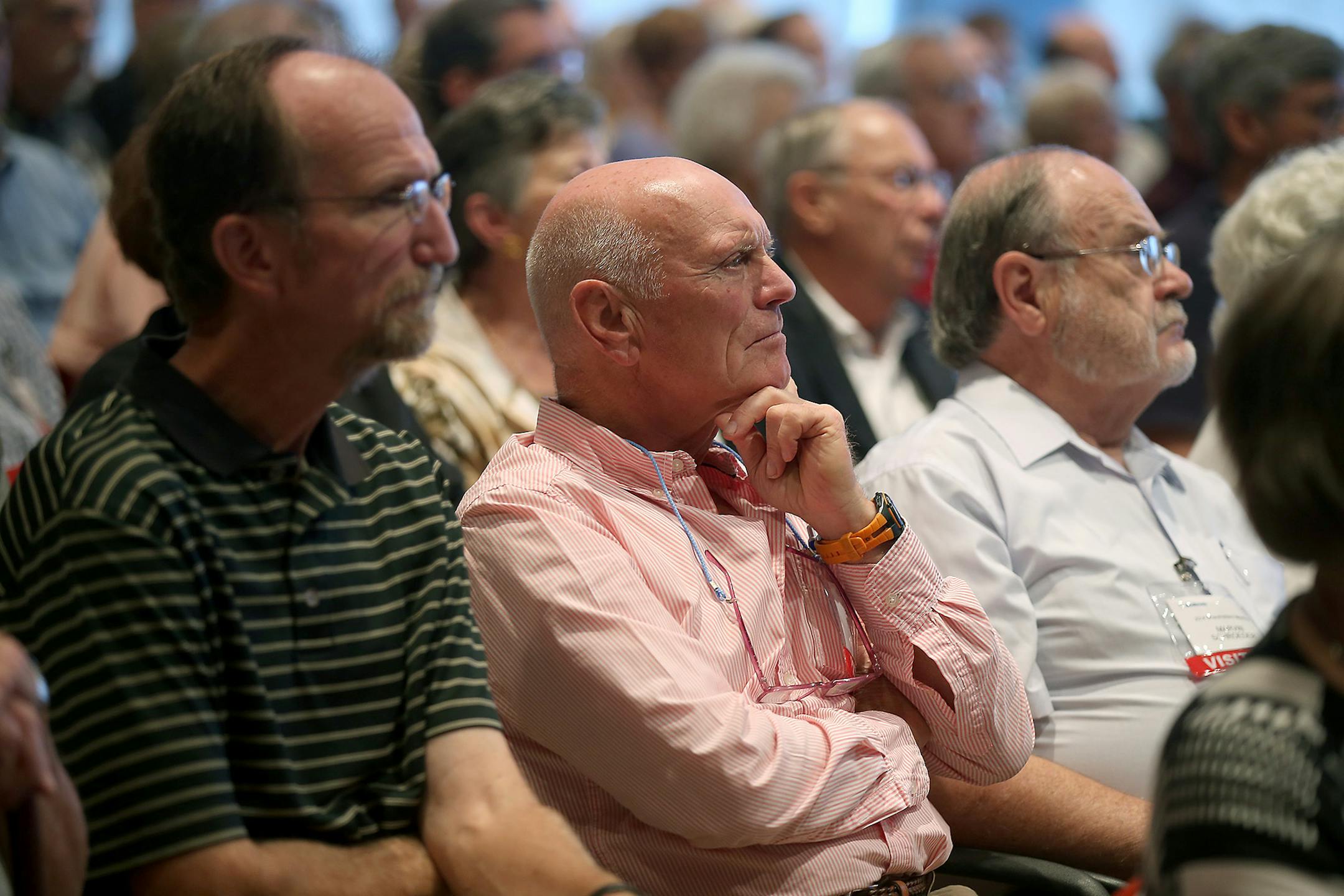 Shareholders watched videos and testimonials during the Medtronic annual shareholder meeting, Thursday, August 21, 2014 in Mounds View, MN. ] (ELIZABETH FLORES/STAR TRIBUNE) ELIZABETH FLORES • eflores@startribune.com