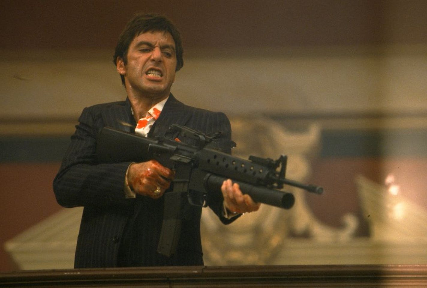 Al Pacino portrays Tony Montana, a Cuban immigrant turned kingpin, in a scene from "Scarface."