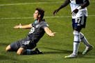 Minnesota United midfielder Ethan Finlay reacts after being called for a foul in the penalty area late in the second half