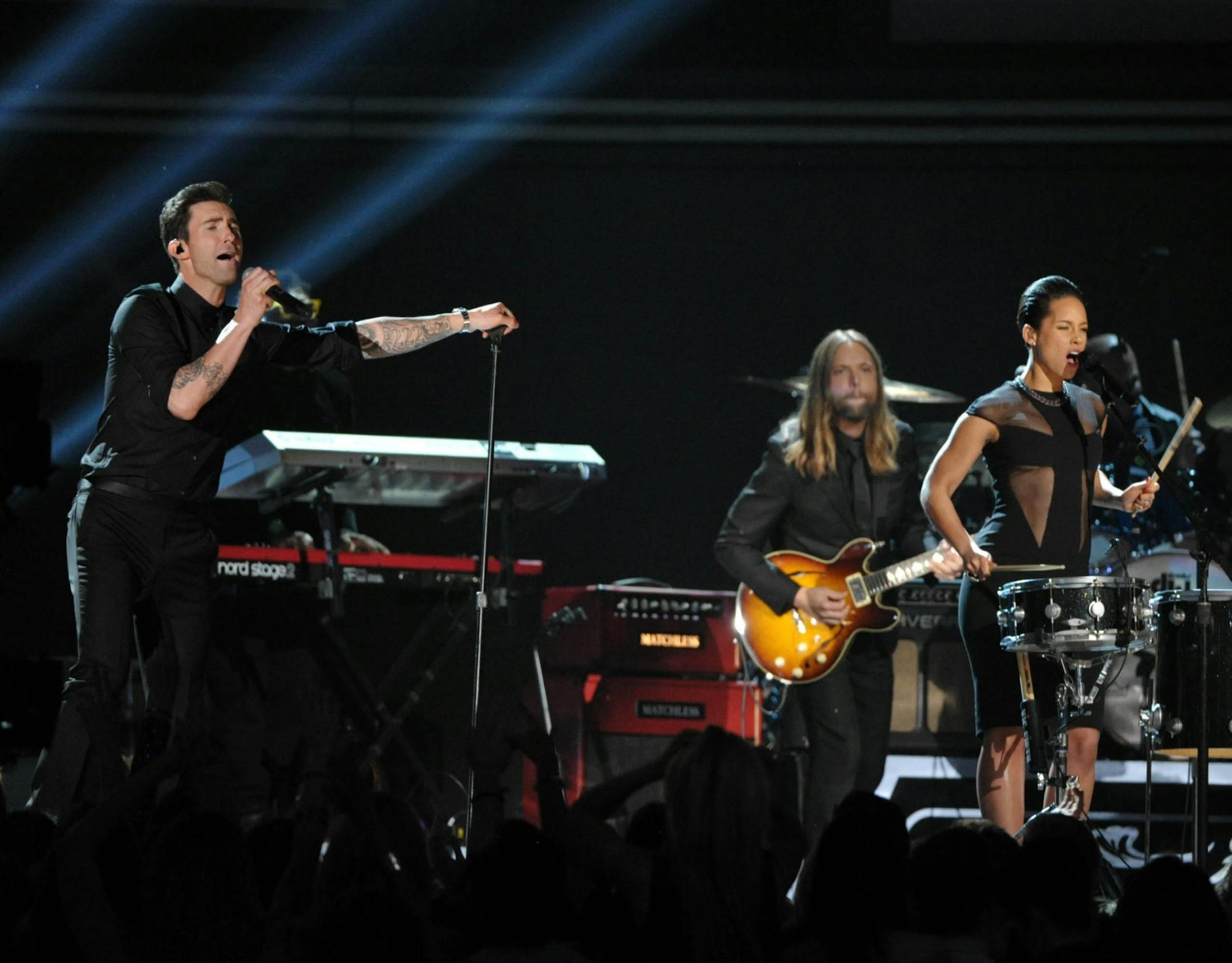 Adam Levin of Maroon 5, left, and Alicia Keys perform at the 55th annual Grammy Awards on Sunday, Feb. 10, 2013, in Los Angeles.