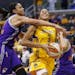 Phoenix Mercury's Candice Dupree, left, fouls Los Angeles Sparks' Candace Parker as Mercury's Diana Taurasi also defends during the second half in Gam