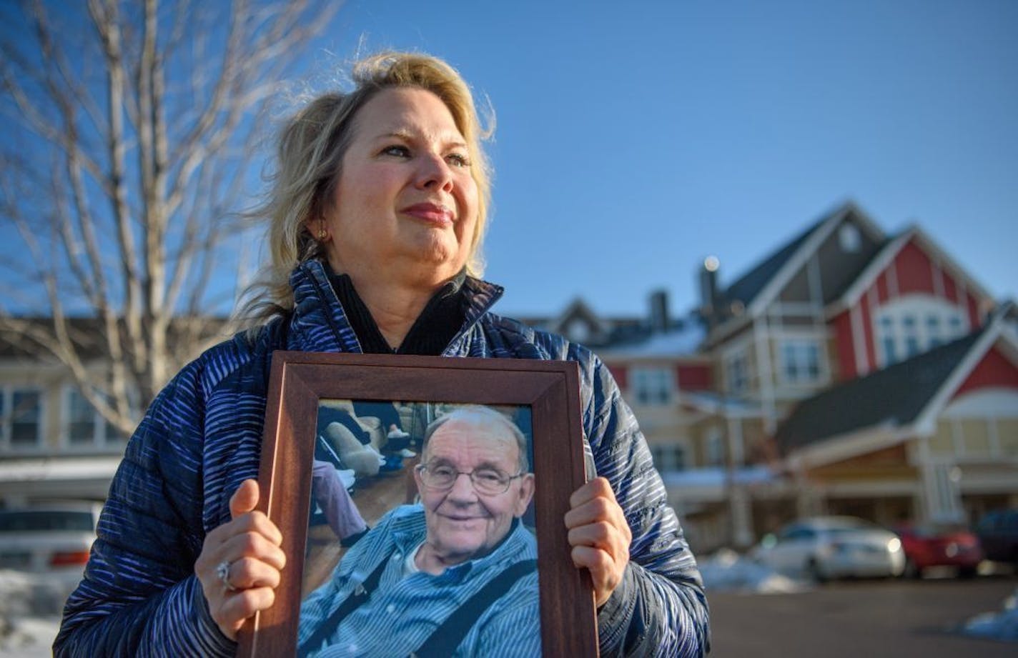 Joan Maurer held a photograph of her late father Gerald Seeger who died nearly a year ago at this senior home, Lighthouse of Columbia Heights. Attorneys for the senior facility are claiming that her wrongful death lawsuit should be thrown out because she signed an arbitration clause.